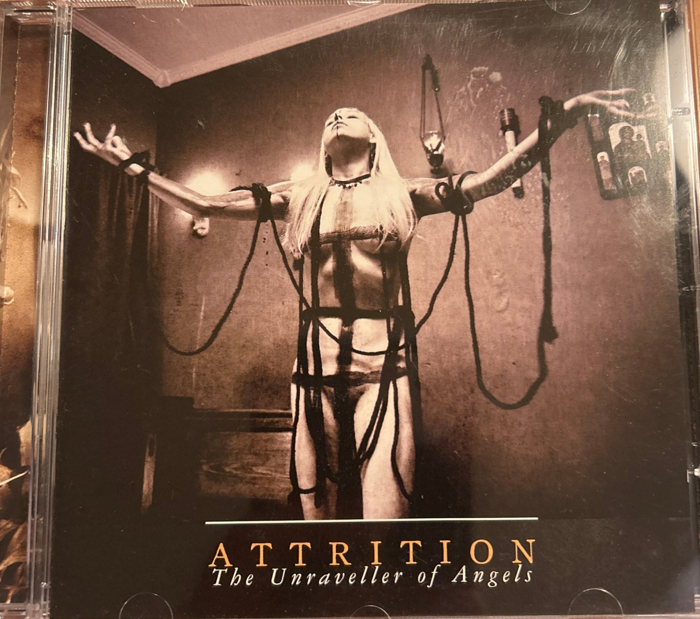 CD Attrition – The Unraveller Of Angels 2ª mano - DISCOS NAKASHA