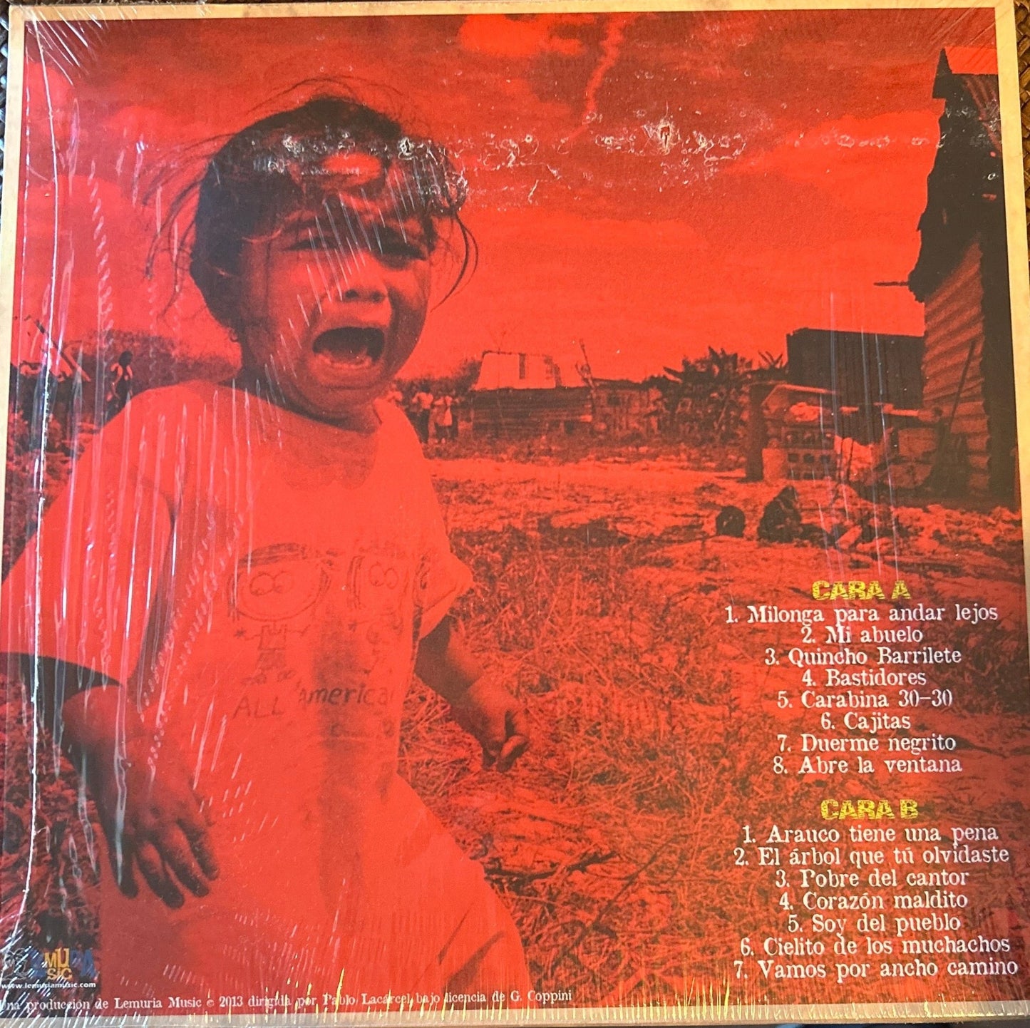 LP Germán Coppini Y Los Voluntarios – América Herida Nuevo precintado - DISCOS NAKASHA