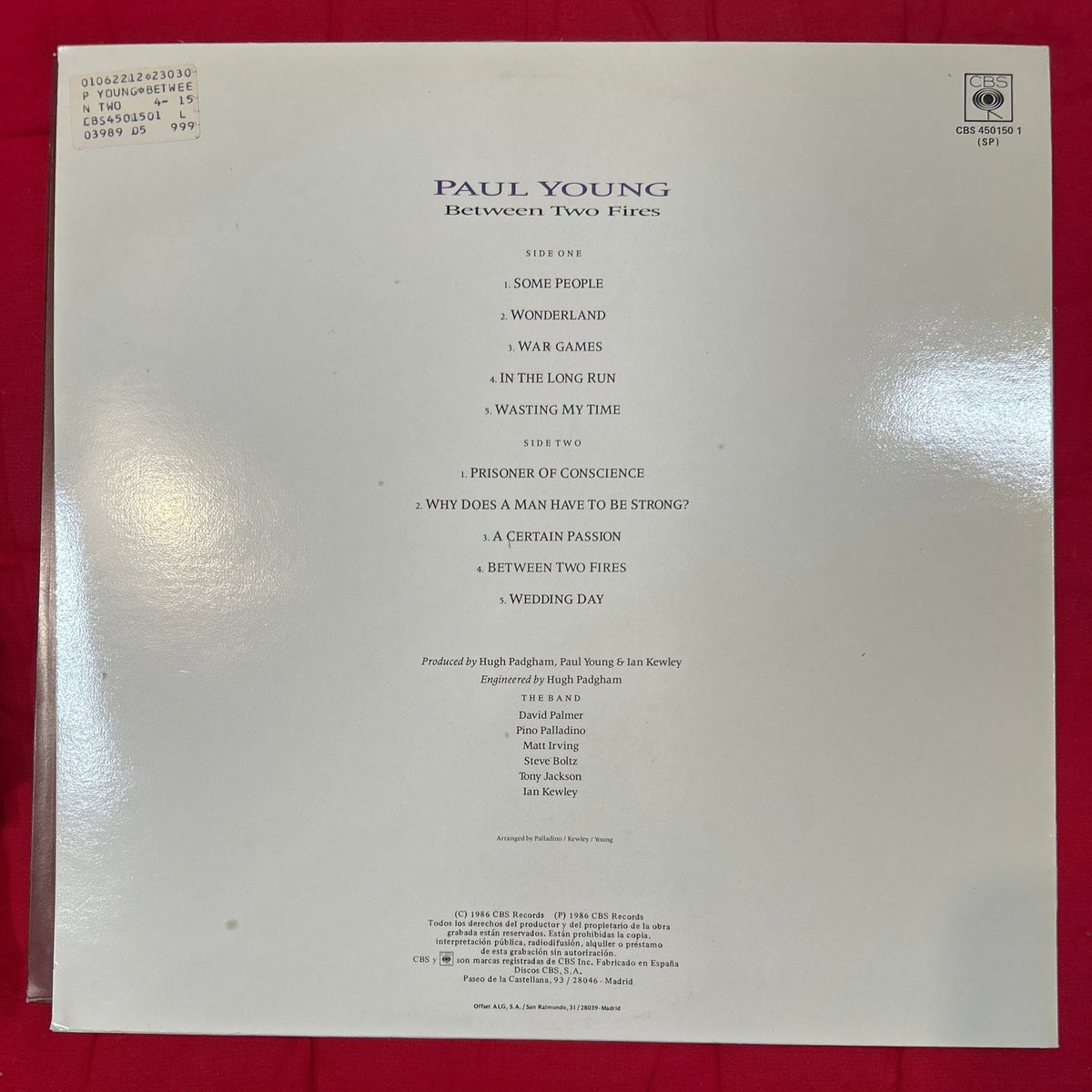 LP Paul Young – Between Two Fires 2ª Mano (Producto exclusivo recogida en tienda) - DISCOS NAKASHA