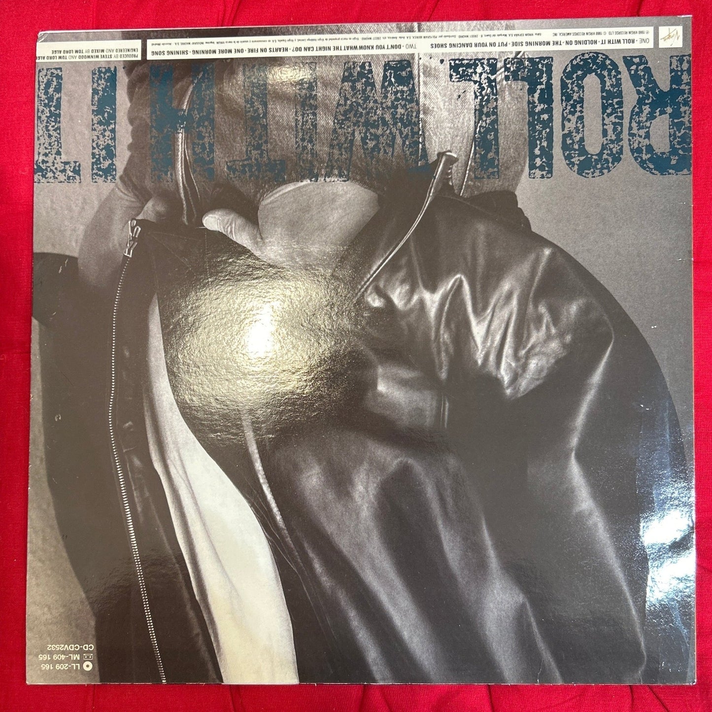 LP Steve Winwood – Roll With It 2ª Mano(Producto exclusivo recogida en tienda) - DISCOS NAKASHA