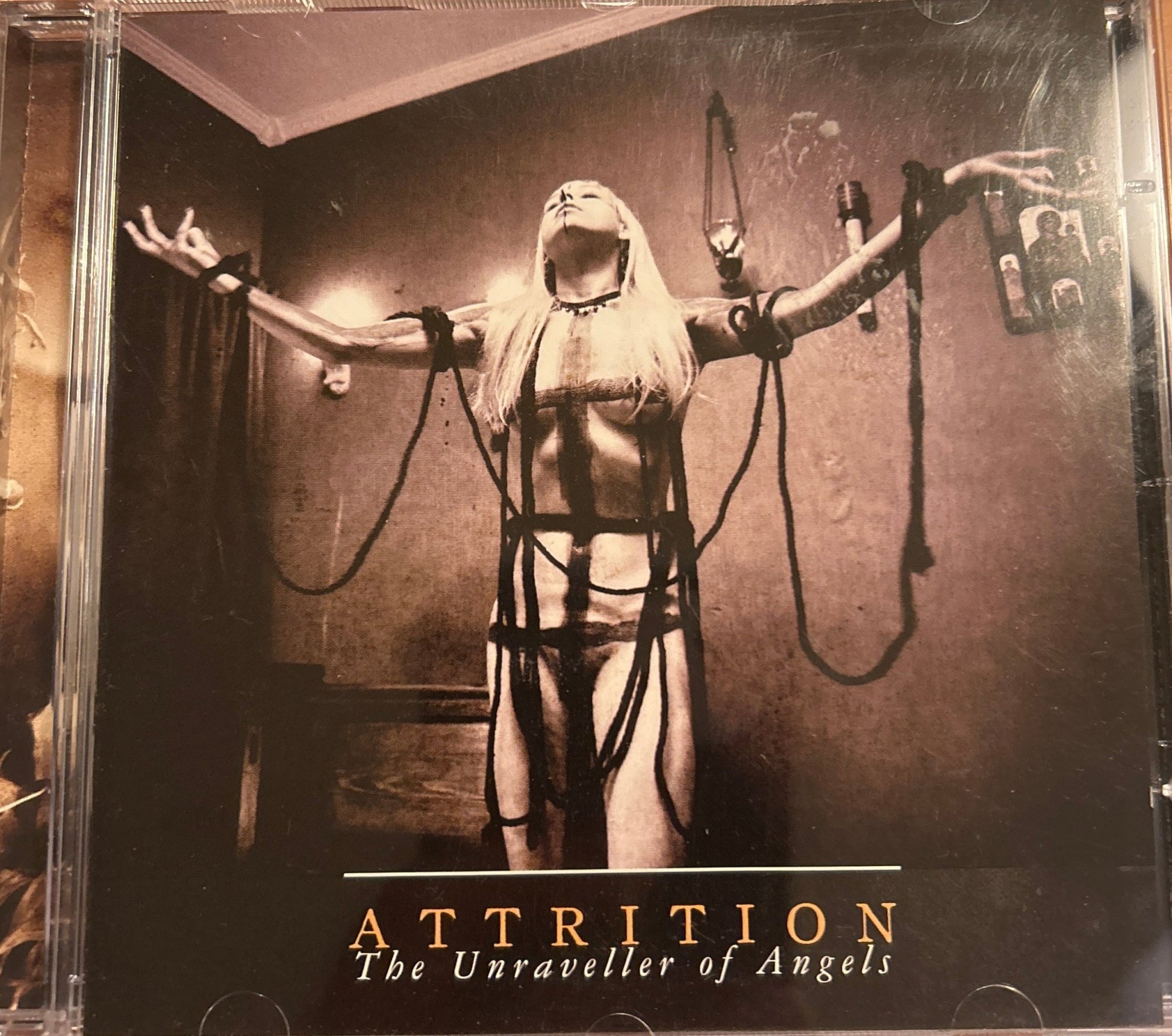 CD Attrition – The Unraveller Of Angels 2ª mano - DISCOS NAKASHA