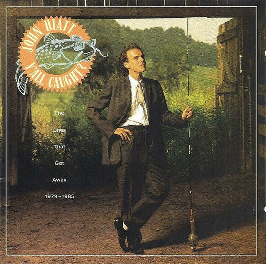 CD John Hiatt ‎– Y'All Caught? - The Ones That Got Away 1979 - 1985 Ed. USA 2ª Mano - DISCOS NAKASHA