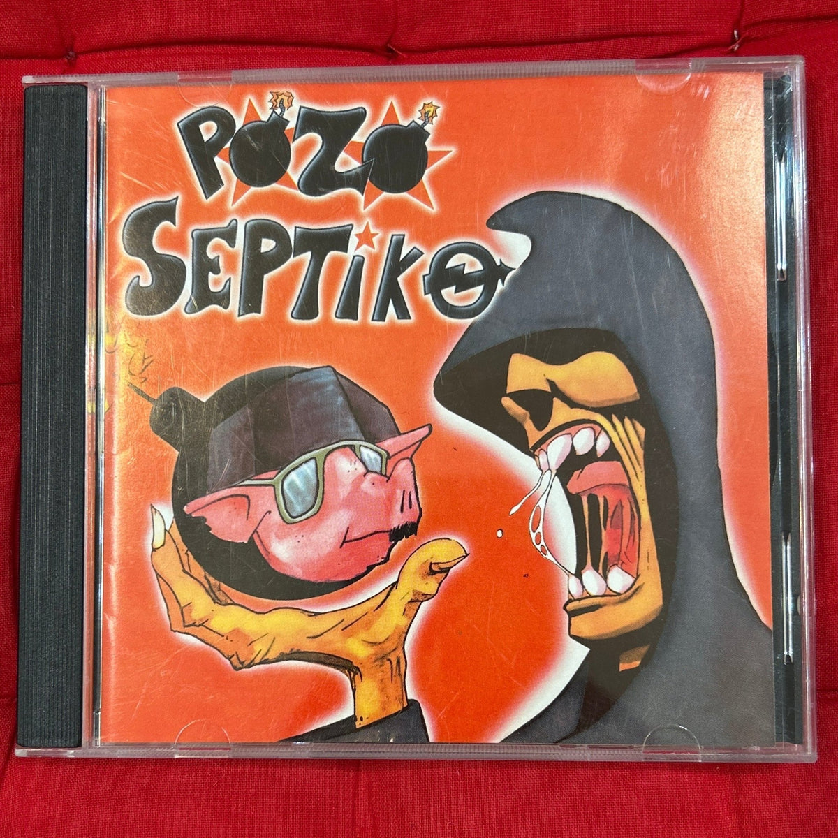 CD Pozo Septiko ‎– En Un Sitio... 2ª Mano - DISCOS NAKASHA