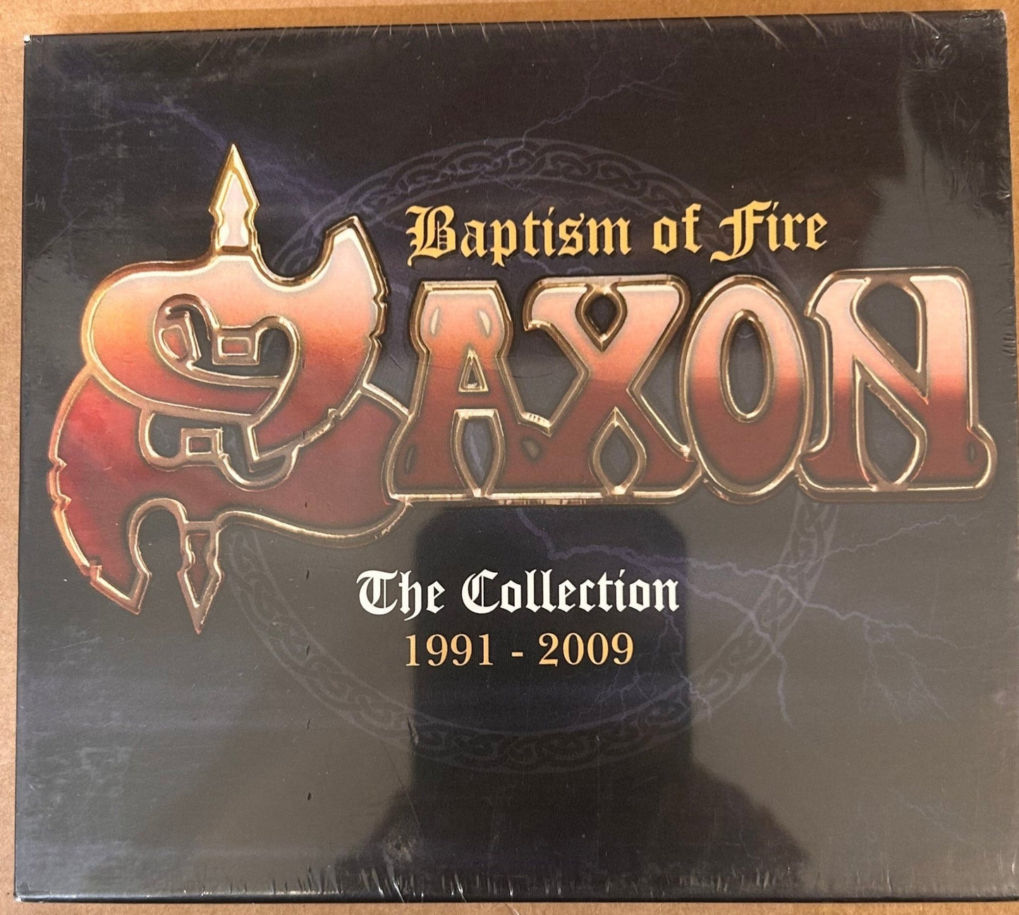 CD Saxon ‎– Baptism Of Fire : The Collection 1991 - 2009 Nuevo precintado - DISCOS NAKASHA