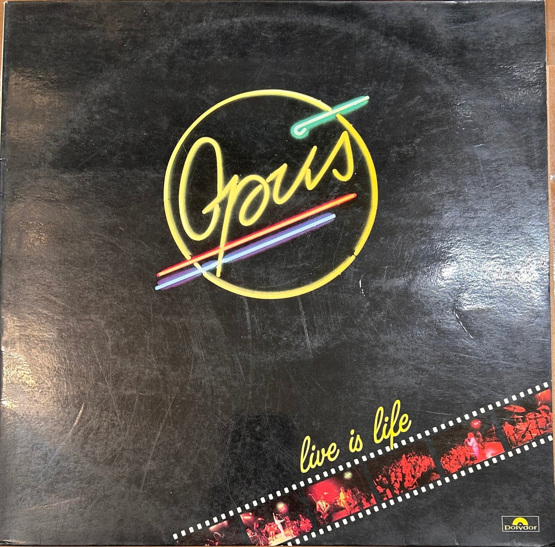 LP Opus ‎– Live Is Life 2ª Mano - DISCOS NAKASHA