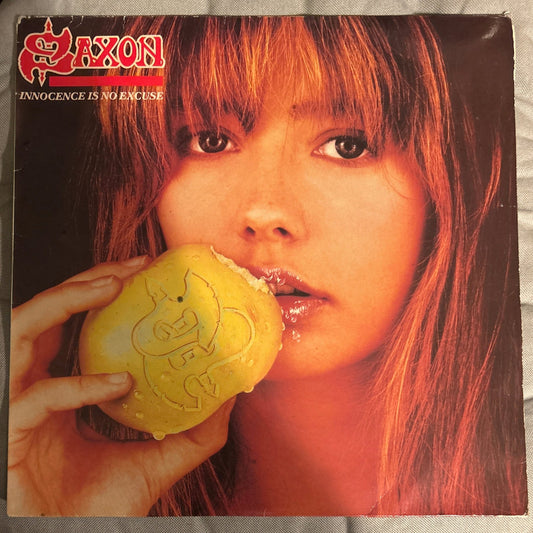 LP Saxon ‎– Innocence Is No Excuse = La Inocencia No Es Excusa 2ª Mano - DISCOS NAKASHA
