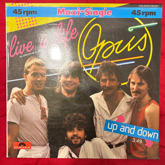 MAXISINGLE Opus ‎– Live Is Life 2ª Mano (Producto exclusivo recogida en tienda) - DISCOS NAKASHA
